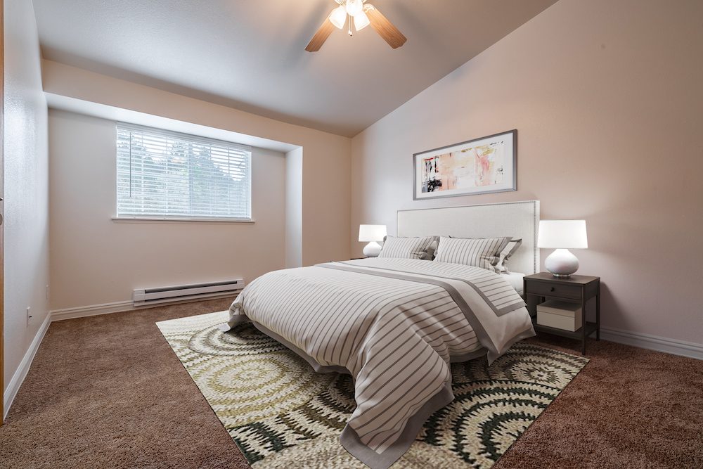 Bedroom with a ceiling fan at Westridge