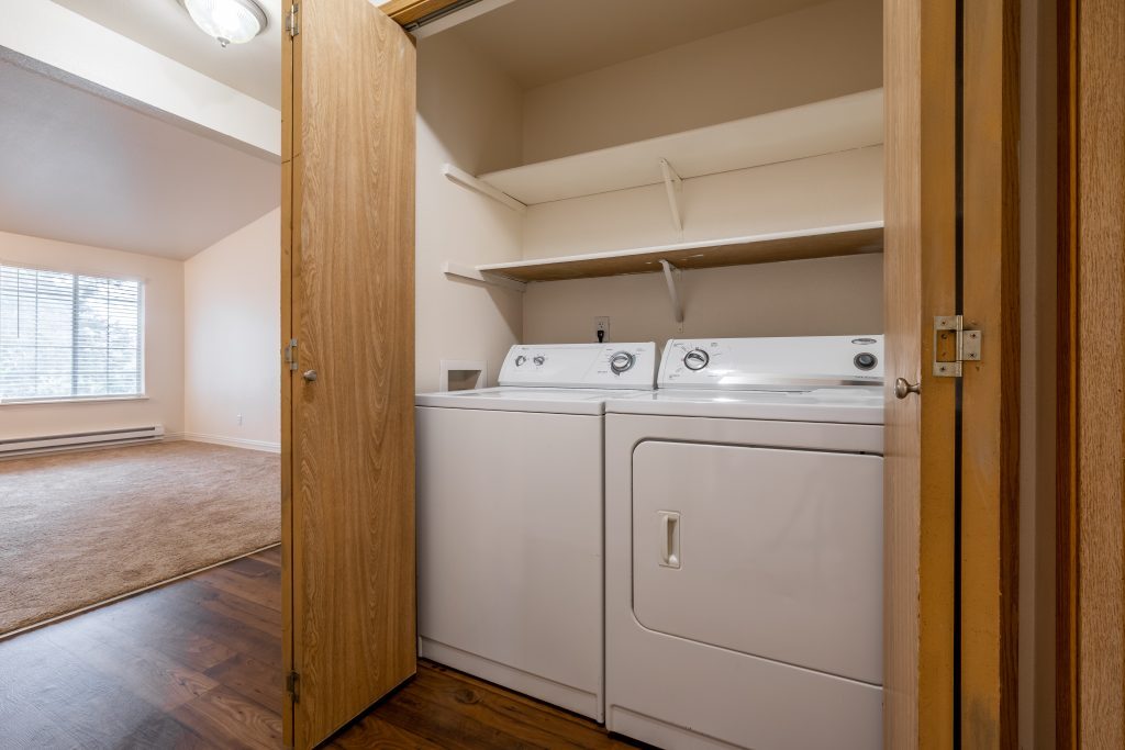 Full size washer and dryer inside the apartment